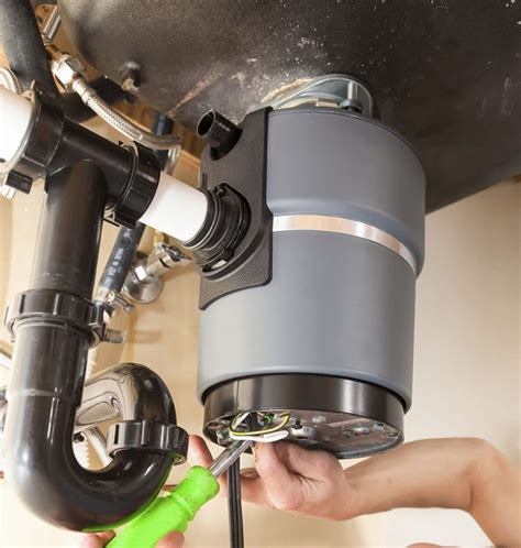 Garbage Disposal Leaking from Bottom: Quick Fix Solutions!